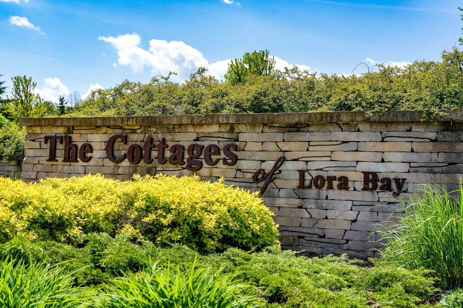 The Cottages of Lora Bay sign