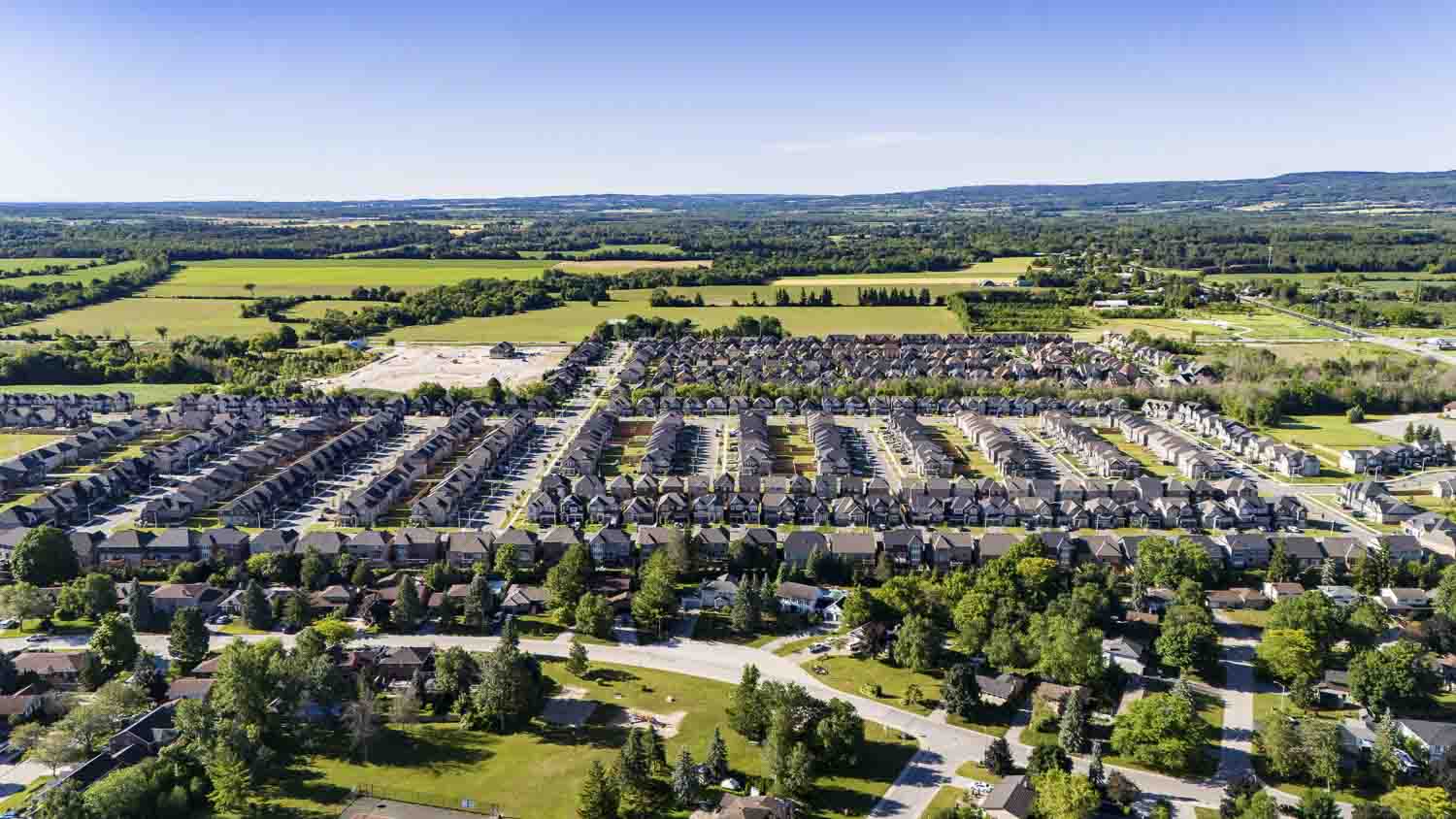 Aerial of Sunvale, Indigo and Pretty River Estates in Collingwood looking West